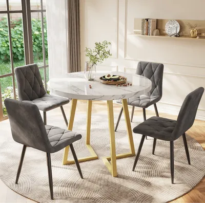 A dining table set with four chairs in a well-lit room with large windows.