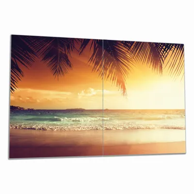 Produktbild von Wallario Herdabdeckplatte aus Glas, Größe 80 x 52 cm 2-teilig, Motiv Sonnenuntergang am Strand in der Karibik