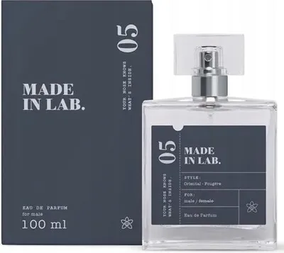 A product shot of a perfume bottle and its packaging.