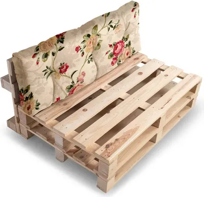 A sofa cushion set made from wooden pallets and floral fabric.