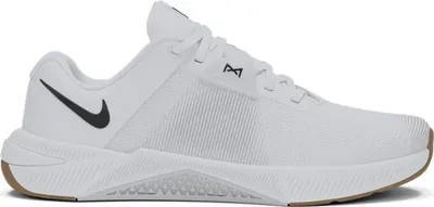 A single white Nike Metcon training shoe is shown from the side against a white background.