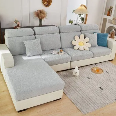 Imagen del producto de Fundas elásticas antideslizantes para sofá Unyqoos®, ideales para sofás en forma de L, color gris claro, dimensiones 70x70x20 cm, compuestas por 85% poliéster y 15% Elasthan