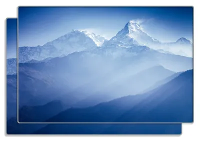 Produktbild von Wallario Frühstücksbrettchen 2er Set aus Glas, je 20 x 30 cm, mit rutschfesten Füßen, Motiv Sonnenaufgang  in  den  Bergen