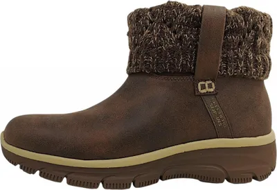 A side view of a brown boot with a knitted cuff.