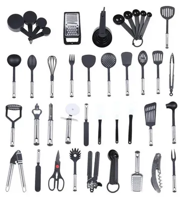 A collection of kitchen utensils laid out on a white background.