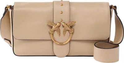A beige leather handbag with gold hardware.