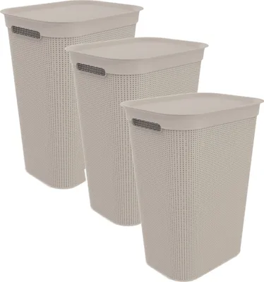 Three laundry baskets of varying sizes are arranged diagonally on a white background.