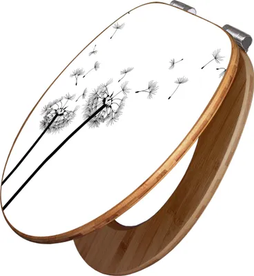 A toilet seat with a dandelion design.
