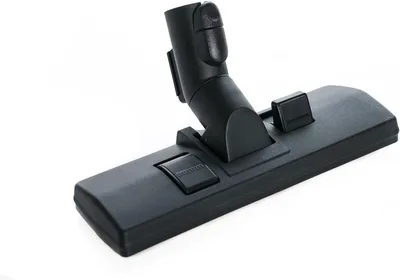 A black vacuum cleaner attachment is shown on a white background.