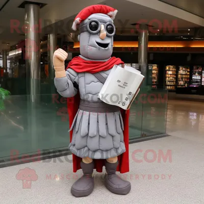 Productafbeelding van Grijze Romeinse soldaat mascotte REDBROKOLY kostuum karakter gekleed met een wikkeljurk en een leesbril