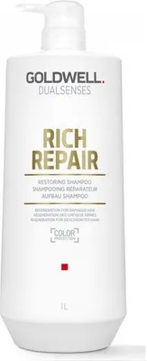 A white bottle of Goldwell Dualsenses Rich Repair Restoring Shampoo with a pump dispenser.