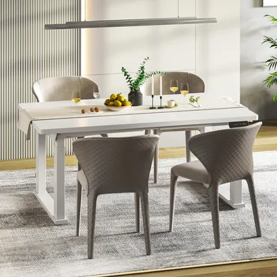 A dining table set up in a modern dining room with chairs, tableware, and a centerpiece.