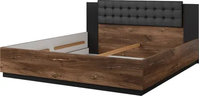 A bed frame with a wooden finish and a tufted headboard.