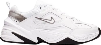 A side view of a white Nike M2K Tekno sneaker against a white background.