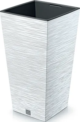 A white square planter with a textured pattern.