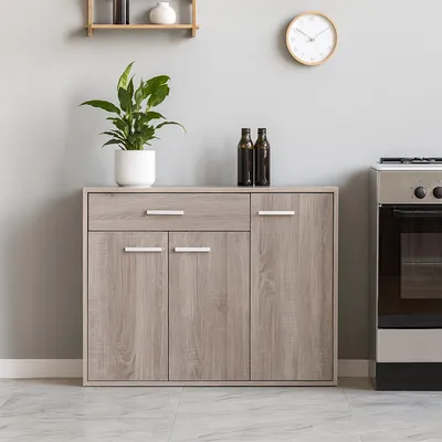 A wooden cabinet with drawers and doors, placed in a kitchen setting next to a stove.