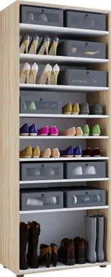 A tall, narrow shoe cabinet with multiple shelves filled with shoes and storage boxes.