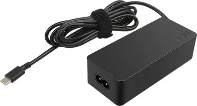 A black laptop power adapter with a USB-C cable.