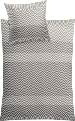 A folded duvet cover and pillowcase with a herringbone pattern.