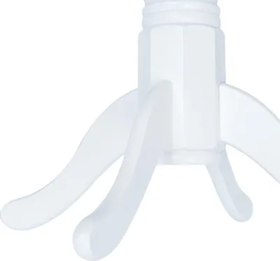 A close-up view of the white base of a table with three curved legs.