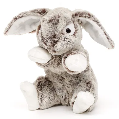 A plush bunny toy sits on a white background.