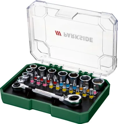 A set of tools in a green and clear plastic case.