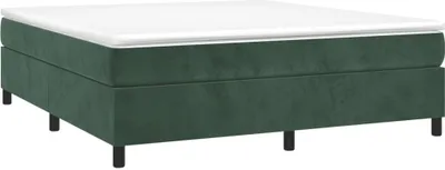 A green upholstered bed base with a white mattress on top, shown from a side angle on a white background.