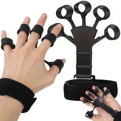 A hand wearing a finger exerciser device, with another hand wearing a similar device in the foreground.