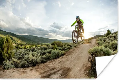 Produktbild von MuchoWow® Poster Frau springt auf ein Mountainbike 180x120 cm - Fotoplakat