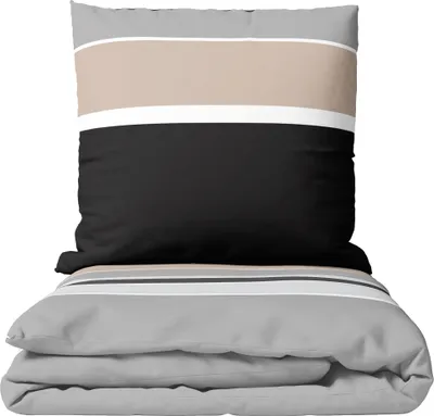 A folded duvet cover and a pillowcase with a striped pattern.
