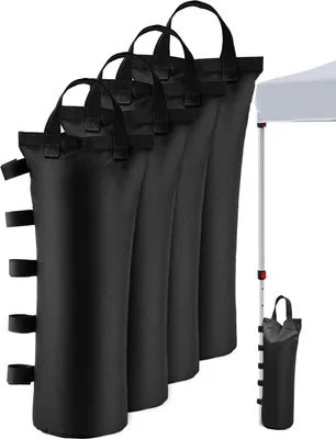 A set of black sandbags for canopy tent weights, shown in a studio setting with a partial view of a tent pole and canopy.