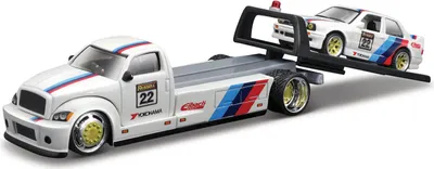 Immagine prodotto di Maisto - Design Elite Transport, pianale Maisto + BMW M3 del 1988, 1:64