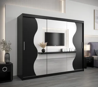 A modern bedroom with a large wardrobe featuring mirrored doors and a built-in TV.