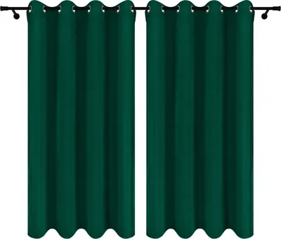 Two dark green curtains hanging on a curtain rod against a white background.