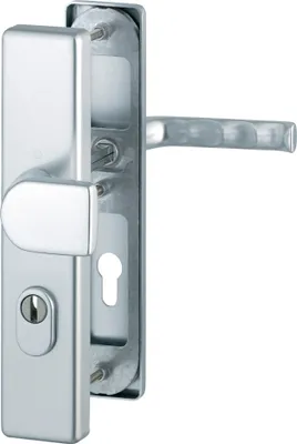 A close-up view of a silver door handle set with a keyhole.