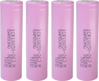 Four pink cylindrical batteries are lined up vertically against a white background.