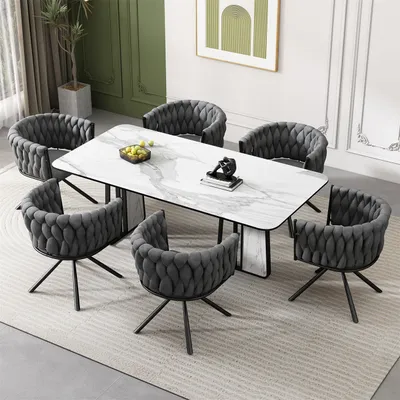 A dining room set with a marble-top table and six chairs.