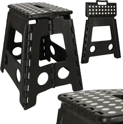 A black folding stool with white polka dots is shown from multiple angles against a white background.