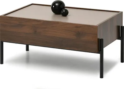 A modern coffee table with a wooden finish and black legs, featuring two decorative spheres on top.