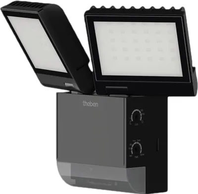 A black LED spotlight with two adjustable light heads and an integrated motion detector.