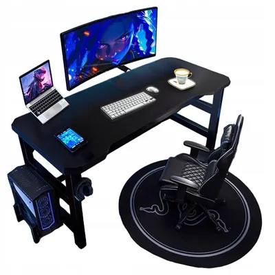 A gaming desk setup with a computer, laptop, monitor, and chair.