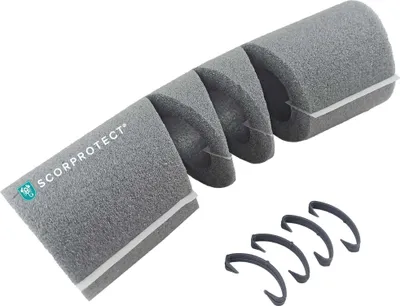 A product shot of grey foam pipe insulation and clips on a white background.
