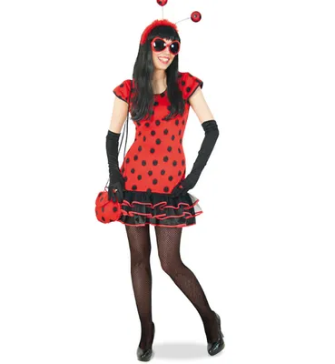A woman is posing in a ladybug costume against a white background.