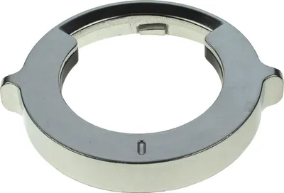 A close-up studio shot of a silver metal ring with a black inner lining.