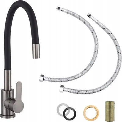 A kitchen faucet with a flexible black hose and a brushed metal finish, along with two braided water supply hoses and various small plumbing parts, is displayed against a white background.