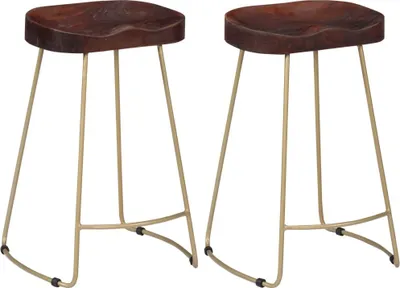 Two bar stools with wooden seats and gold metal legs against a white background.