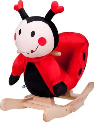 A plush ladybug rocking toy on a wooden base.