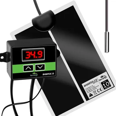 A heating mat with a thermostat and temperature display.