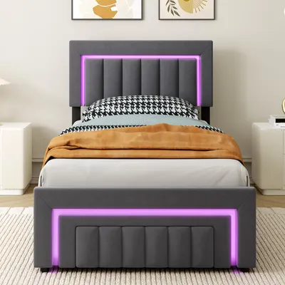 Image de okwish Lit capitonné 90×200 avec éclairage LED et coffre de lit, lit simple avec tiroirs et roulettes, lit pour adolescent en gris, sans matelas.