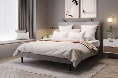 A modern bedroom with a bed, nightstand, and window seat.
